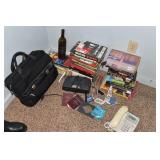 BOOKS, COMPUTER BAG, PHONE, ALARM CLOCK, WINE
