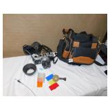 OLYMPUS OM-1 CAMERA WITH CASE; CAMERA ACCESSORIES