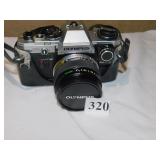 OLYMPUS OM10 WITH CASE BROKEN SNAP ON BACK OF