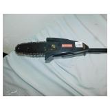 GAS TREE SAW LOOKS UNUSED