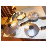 POTS AND PANS WITH LIDS; LIKE NEW; SOME WEAR EVER