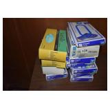 12 BOXES OF EXAM GLOVES STATIONARY