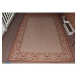 87" X 62" TAN/RUST COLOR PATIO RUG