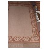 87" X 62" TAN/RUST COLOR PATIO RUG