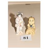 TWO CARVED BONE STATUES, MAN