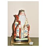 PORCELAIN ORIENTAL MALE FIGURE MODERN ON BRASS