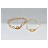 BRACELETS: TWO ONE LARGE HAND KNOTTED AND TALBOT