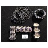 SET OF BLACK METALLIC BANGLE BRACELETS, BEADED