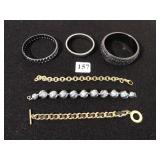 SIX BRACELETS THREE BANGLE, TWO CHAIN BRACELETS,