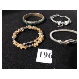 FOUR LADIES BRACELETS SILVER TONE METAL WITH