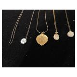 SIX NECKLACES, FOUR WITH PENDANTS, SILVER CHAIN,