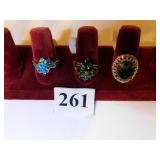 THREE 10K GOLD LADIES COSTUME JEWELRY RINGS GREEN