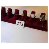 FOUR STERLING SILVER RINGS AND ONE 10K RING WITH