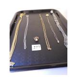 FIVE NECKLACES AND ONE 10K GOLD RING