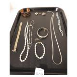 NECKLACES, BRACELETS, AND CHARMS