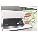 FOOD SAVER W/ 1 FULL BOX BAGS