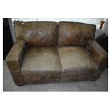 LEATHER LOVESEAT 62" W M ATCHES LOT 68