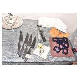 4 KUHN RIKON STEAK KNIVES, LUCITE NAPKIN RINGS,