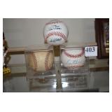 3 BASEBALLS  2 ARE SIGNED WITH CASES