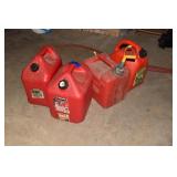 2 GAS CANS 1 - 1/2 FULL
