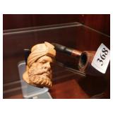 TWO PIPES CARVED FIGURES
