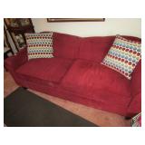 MODERN RED SOFA MAY FURNITURE CO HAS SOME SPOTS