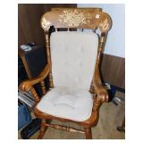 WOODEN ROCKING CHAIR WITH GOLD AND RED FLOWER