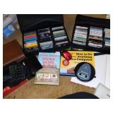 CASSETTES IN CASES, BOOKS, PORTABLE CD PLAYER