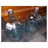 TWO GLASS WATER BOTTLES