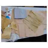 LEATHER BOLT OF FABRIC ETC.