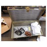 TRUNK W/ T SHIRTS 2 CALCULATORS