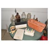 GLASS BOTTLES, FIGURAL MAN ON SWING, BIRDS ON