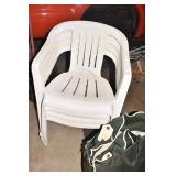 FOUR WHITE STACK CHAIRS & CHAIR COVERS