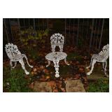 CAST IRON THREE CHAIRS AND TABLE ORNATE