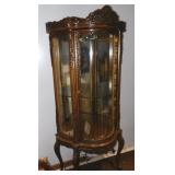 HEAVILY CARVED CURIO CABINET W/ 3 ROUNDED SHELVES