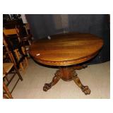 44" ROUND OAK TABLE CLAW FEET