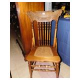 OAK CANED SEAT CARVED BACK CHAIR