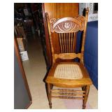 SINGLE OAK CANE SEAT CARVED BACK CHAIR