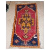 GORGEOUS RED, GOLD, NAVY RUG. 41" X 16". SOME