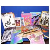 LARGE GROUP OF GUITAR BOOKS, GUITAR STICKS AND