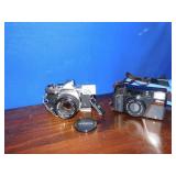 OLYMPUS OM-1 CAMERA W/ 50 MM LEN & NIKON ONE