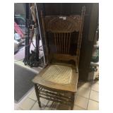 SINGLE OAK CANE SEAT CARVED BACK CHAIR