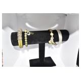 4 BRACELETS, GREEN BEADED, ETC.