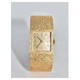 WATCH: 18K SWISS UNIVERSAL GENEVA 215-1324570-