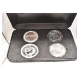 FOUR COIN SILVER SET IN BLACK CASE 4 DIFFERENT