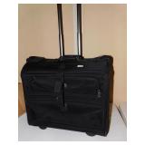 ROLLING SUIT FOR SUITS/DRESSES, LIKE NEW