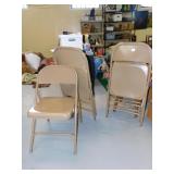 FOUR METAL FOLDING CHAIRS