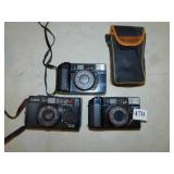 2 CANON 48MM CAMERA ETC.