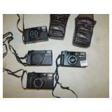 NIKON CAMERAS, 35MM AND 28 MM ETC.
