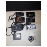 CANON LENS 28MM; SONY WALKMAN; ULTONIC PARORAMIC;